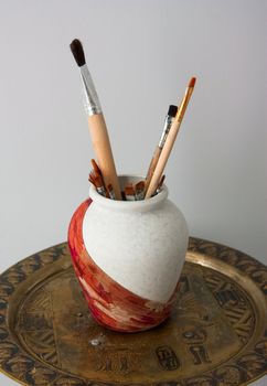 vessel with artistic brushes