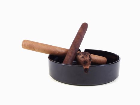 Two unlit cigars with a clean ashtray over a white background with room for text