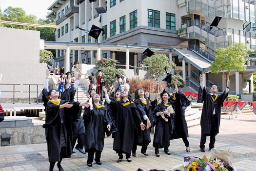 University students graduate with happiness