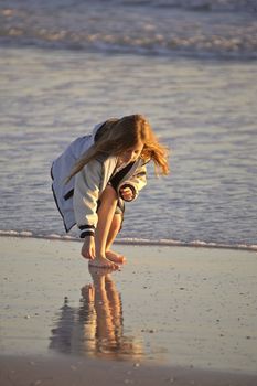 Girl playing on a Florida beach