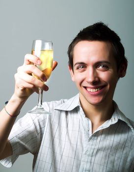 Young man drinking champaign