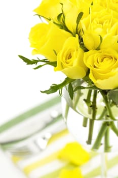 Place setting with yellow roses