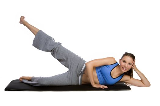 Isolated fitness mat woman exercising