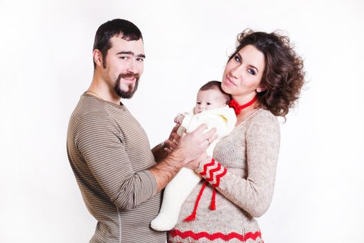 beautiful pregnant woman in a sweater with baby