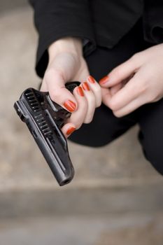 gun in female hands