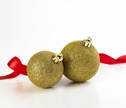 christmas balls with red ribbon