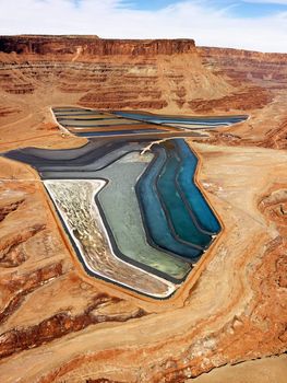 Aerial landscape of tailing ponds for mineral waste in rural Utah, United States.