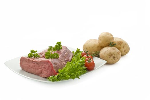fresh beef joint with vegetables