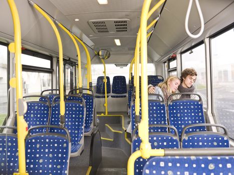 Young couple sleeps on the bus