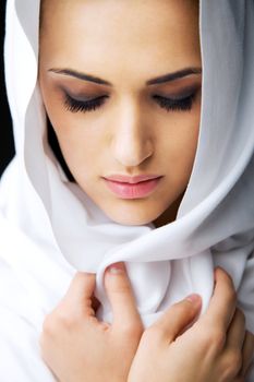 Beautiful veiled woman face