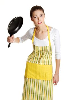 Upset female teen with a frying pan.