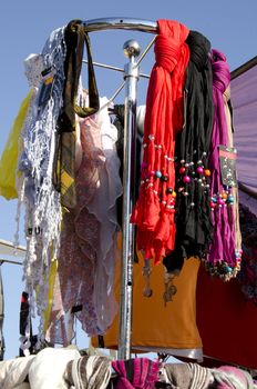 Headscarf cloak and colorful scarves sell market 