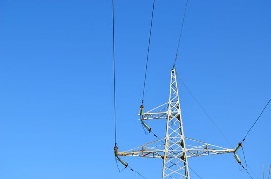 electricity wire and pole in background blue sky 