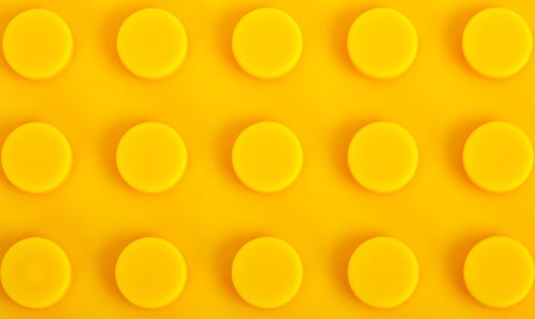 close-up yellow plastic construction background