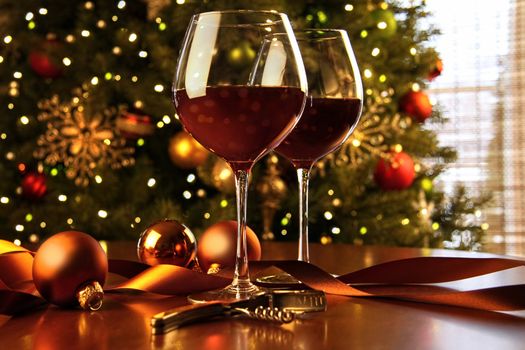 Red wine on table Christmas tree