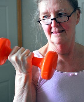 Mature female working out at home.