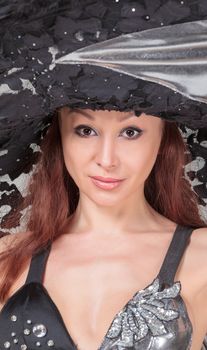 Portrait of Beautiful Lady in a Lace Hat, closeup