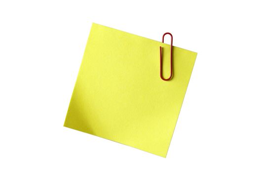 Yellow sticky notepaper with red paper-clip isolated on white. E