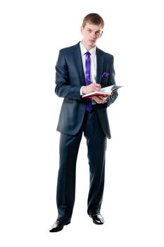 The young businessman in a suit with daily log