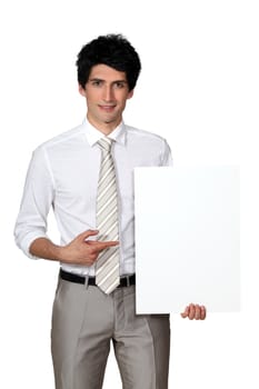Businessman with blank poster