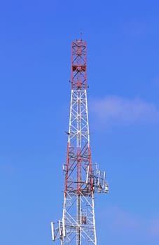 Communication tower over a blue sky 