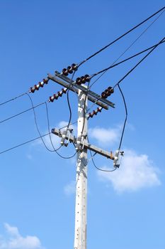 Electrical pole with blue sky 