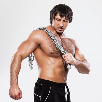 Agressive bodybuilder with chain
