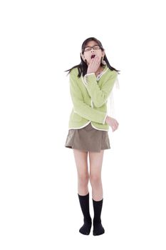 Girl in green sweater and glasses looking up, yawning