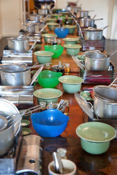 cookware on long table