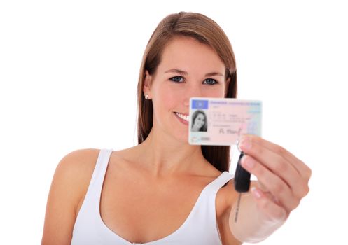 Young woman presenting her drivers licence. All on white background.
