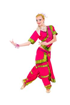 full length portrait of indian woman dancing in studio.  Isolated on white background.
