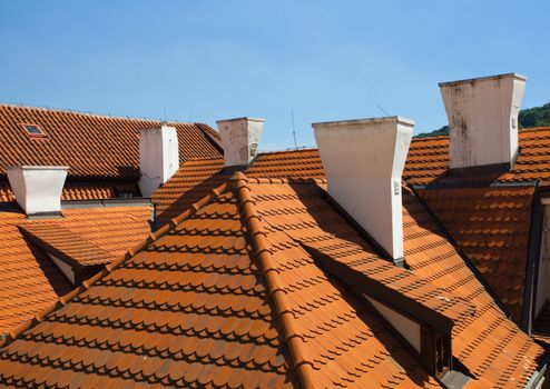 tiled roofs against the sky