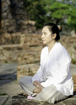 Buddhist woman meditating