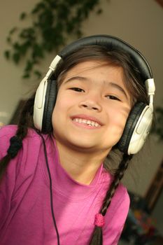 Six year old listening to music