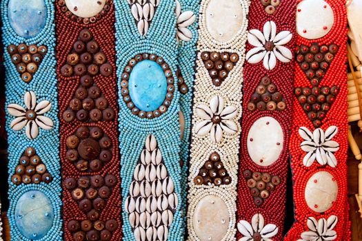 colorful handcrafted belts with sea shells