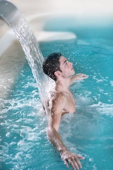 spa hydrotherapy man waterfall jet turquoise