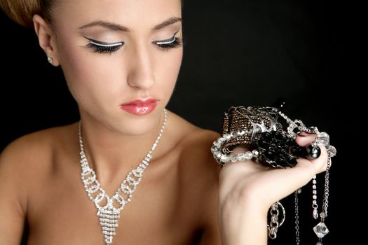 Ambition and greed in fashion woman with jewelry