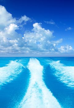 Boat wake prop wash on turquoise sea