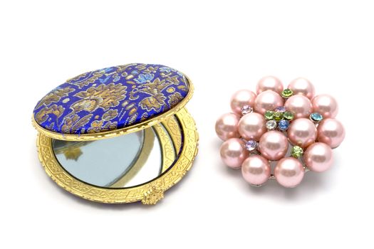 cosmetic mirror and brooch