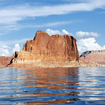 Red cliff reflected in the lake Powell