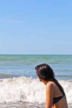 Girl on a deserted beach