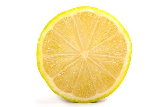 Single cross section of yellow lemon, isolated on white backgrou