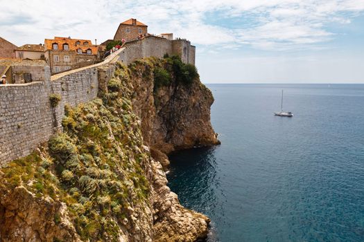 Yacht Approaching Impregnable Walls of Dubrovnik, Croatia