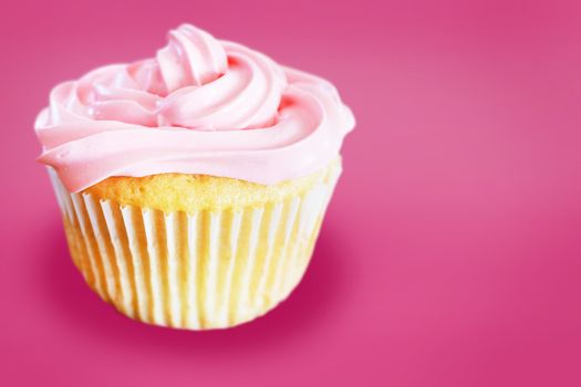 Vanilla cupcake with pink frosting