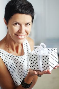 Middle aged woman with a gift