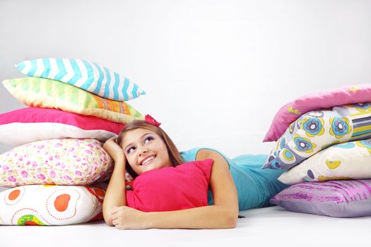 Girl restion on pillows