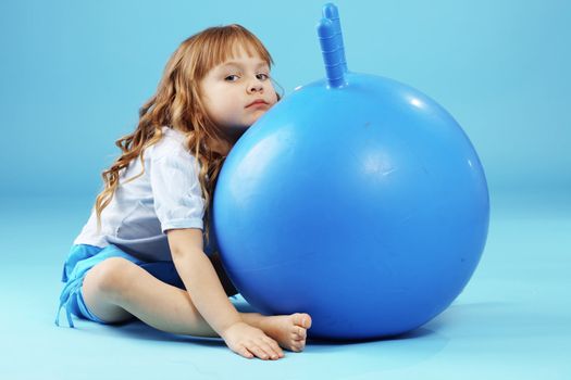 Child with gymnastic ball