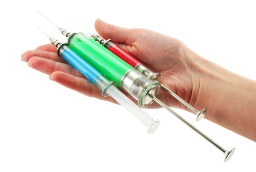 Three reusable syringes with acid substance in hands