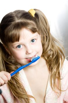 Stock photo: an image of a nice girl with toothbrush