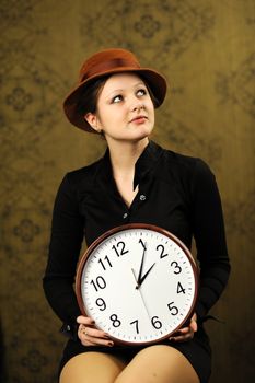 Woman with a big clock
